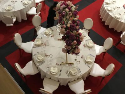 Rose Gold Louis Dior chairs with faux ivory leather seat pads